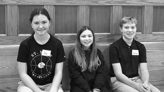 Lily Herman, an eighth graders was first in the St. Mary School annual spelling bee. Also picture from left is fifth grader Kayleigh Harnick and eighth grader Andrew Grant, alternate. Courtesy photo
