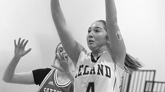 Leland senior Mallory Lowe drains mid-range shot against Suttons Bay earlier this season. Enterprise photo by Brian Freiberger