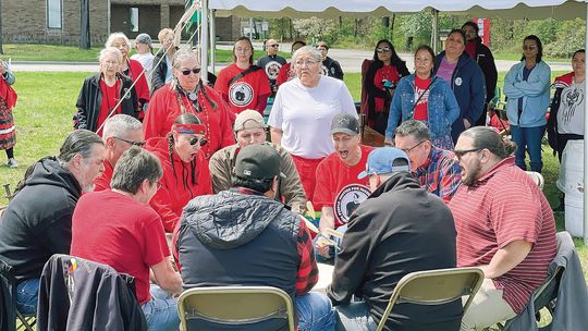 People are pictured gathered around the drum circle at the Grand Traverse Band of Ottawa and Chippewa Indians’ third annual Missing and Murdered Indigenous People (MMIP) Day of Awareness event last Friday in Traverse City. Enterprise photos by Meakalia Previch-Liu