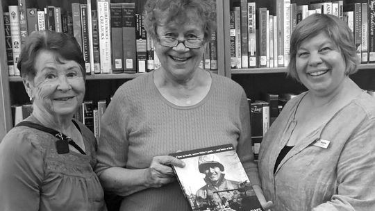 The P.E.O. Chapter EM of Suttons Bay recently presented a copy of the book ‘A Father’s Arms’ to Nellie Danke, librarian of the Suttons Bay-Bingham District Library. Author Mollie Moody compiled notes from her father’s experience in World War II which were published a book. The book was pre...