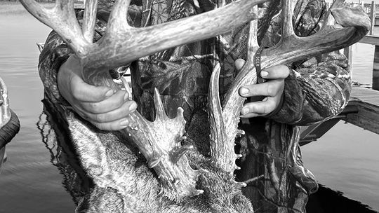While Allen Riggie says he “just got lucky” when still-hunting up to a 21-point buck on North Manitou, he’s a veteran island hunter who has taken a 10-point near his home in Midland. Courtesy photo