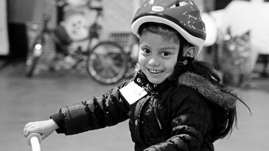 Robert Barnes of Glen Arbor’s non-profit Free Bikes 4 Kidz Detroit” (FB4K) has brought smiles to more than 12,000 children in the Detroit area by providing new bikes and helmets. Courtesy photo