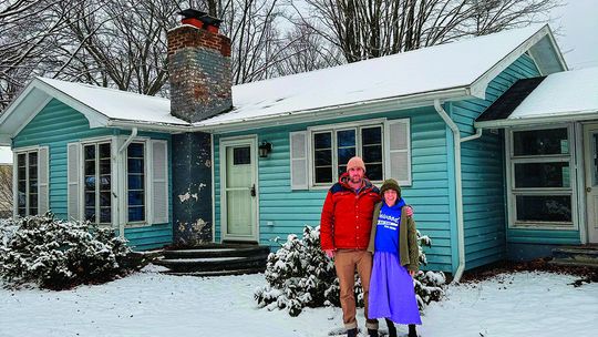 John and Kelly Kehl are all smiles after purchasing their Northport home through Peninsula Housing last week. Courtesy photo