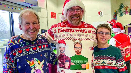 Three generations of the Scripps family, Doug, Dan and Jack (from left), all played in the Northport Community Band at last weekend’s Holiday Concert in Northport. Band members wore their favorite ugly holiday sweater. Photo courtesy of Lisa Drummond