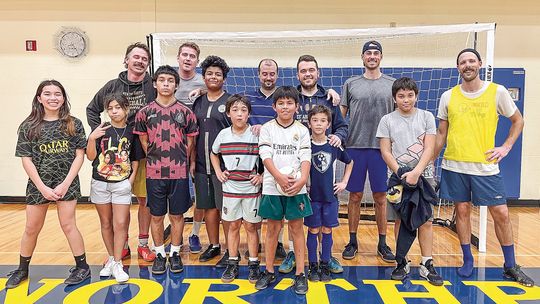 A group of local soccer player of all ages gather at Northport Public School every Tuesday and Thursday for an indoor soccer league that aims to bring the community together. Courtesy photo
