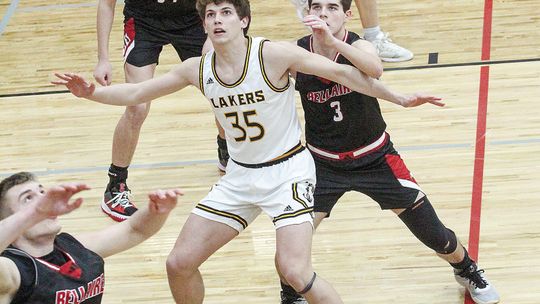 Glen Lake sophomore Jacob Plamondon posts up during a regional final against Bellaire. Plamondon and junior Benji Allen were named first team all-Northwest Conference for the 2023-24 season.