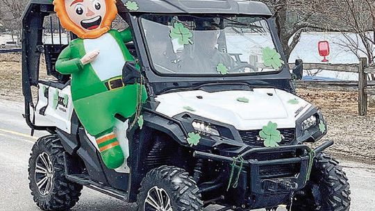 Bill and Susan Krusel and their son William went all out decorating their ORV for the O’Mena St.Patrick’s Day parade. Courtesy photo