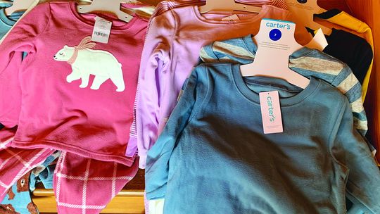 Members of the Glen Arbor Woman’s Club donated 60 pair of pajamas for the Leelanau Christian Neighbors’ baby pantry. Courtesy photo