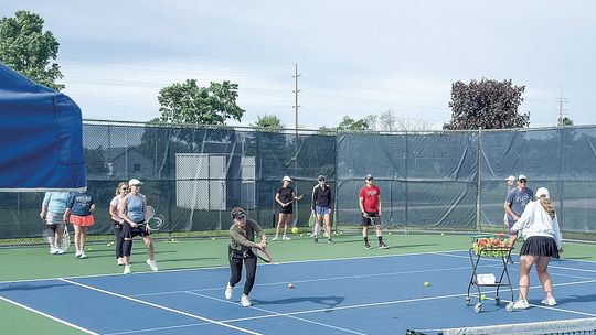 Participant of a Leelanau Love Tennis Clinic in Suttons Bay