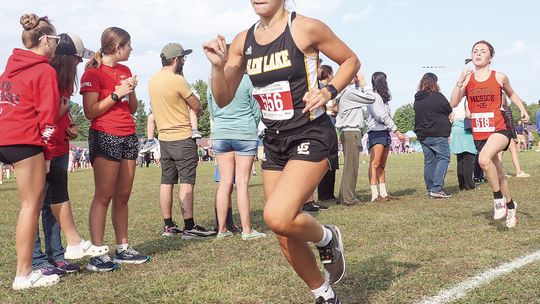Glen Lake senior Emily Alaimo competes during the Pete Moss Invitational at Benzie Central on Saturday.