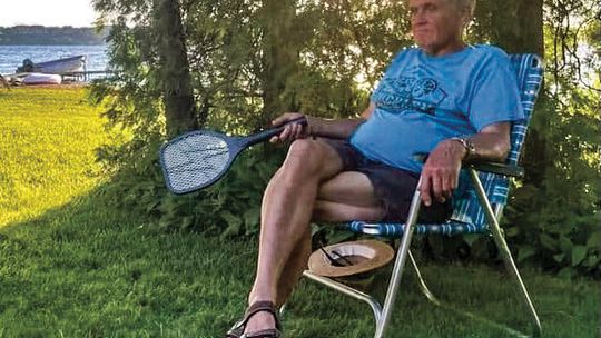 John Popa was a busy man, but he knew how to relax at his home along the shore of south Lake Leelanau. Courtesy photo