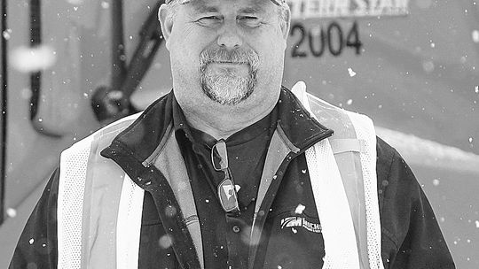 David Priest, a guardian of the roads, has been plowing his way for the Leelanau Road Commission for nearly 15 years. Enterprise photo by Brian Freiberger