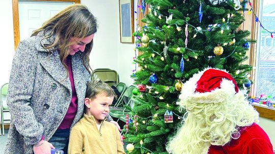 Santa makes his annual stop in Omena