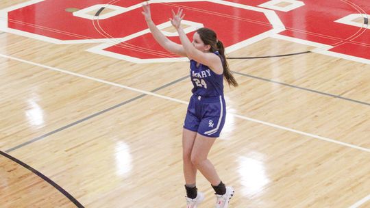 Lake Leelanau St. Mary senior Sarah Bunek hits a 3-pointer against Suttons Bay on Tuesday. Enterprise photos by Brian Freiberger