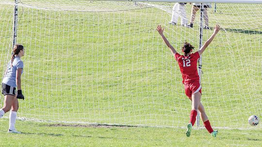 Suttons Bay senior Keeley TwoCrow scores during an 8-0 win over Glen Lake last week. Enterprise photo by Brian Freiberger