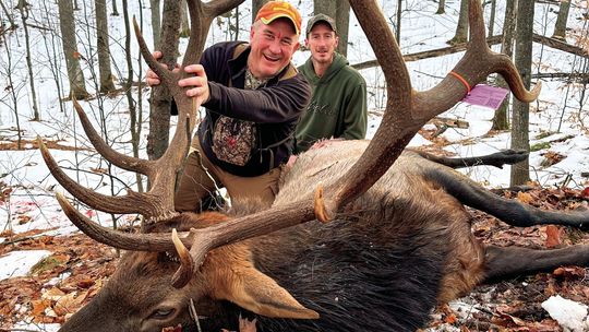 Roger Schaub, left, stalked elk with guide James Bunker for six days before they caught up with this 700-pound trophy. Schaub’s gun went click, but the second shot worked. Courtesy photo