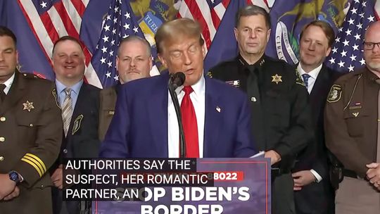 Sheriff Mike Borkovich, right, was among members of the Michigan Police Officers Association (MPOA) attending a Trump rally Tuesday in Grand Rapids. NBC News screen capture