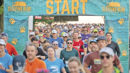 Runners start the Sleeping Bear Marathon at Empire Beach that weaves throughout the Sleeping Bear Dunes National Lakeshore for most of the day Saturday starting at 7:30 a.m. Photo courtesy of Focal Flame Photography