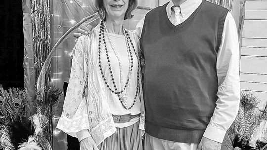 Dale Lersch and John Sanders won the prizes for the Best 1920s outfits at Saturday’s Speakeasy-themed fundraiser at the Willowbrook Mill for the Northport Promise
