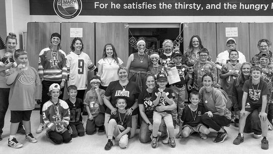 St. Mary K-5 students and their mothers participated in the second annual St. Mary Mother/Son Tournament of Champions. Moms and sons competed in a series of different minute-to-win-it style game/competitions. Score cards were kept and a champion team was crowned for obtaining the most poin...