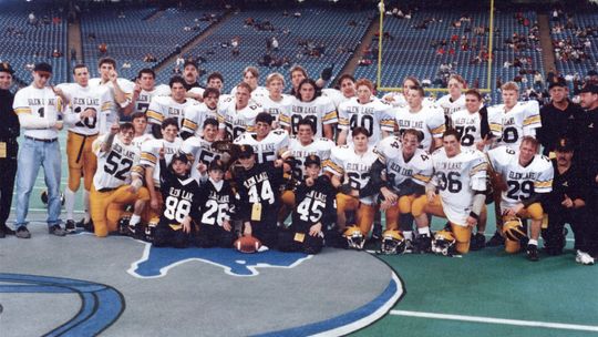 The 1994 Glen Lake Lakers celebrate after winning the schools first state championship after defeating Our Lady of the Lakes Waterford 20-10. Courtesy photo