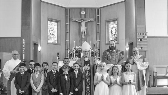 Students at St. Mary School recently received the sacraments of First Communion and Confirmation. Sacraments are outward signs of inward grace, instituted by Christ. Presiding over the ceremony is Deacon Martin Korson, Bishop Jeffery Walsh, Father Ben Martin and Father Ben Rexroat. Courtes...
