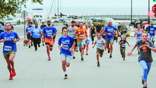 Runners sprint up Braman Hill during the “Bolt to Braman” foot race last year. The Bolt 5 will happen on Saturday, Aug. 31 at 11 a.m. Courtesy photo