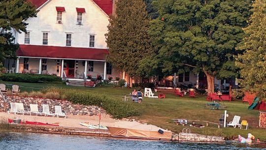 The reflection of a late-summer sunset at historic Fountain Point on Lake
