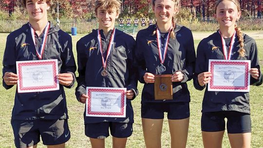 Courtesy photo The Leland Cross Country team finished the regular season strong at the Shepherd Div. 4 State championship. From left to right: Carter Suttman, Christopher Knudsen, Ella Knudsen and Sophie Grinage.