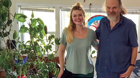 Lydia and Tom Woodruff have been sifting through the archives in their home to find artwork that will be used at the opening reception for the “Follow the Art: Tom Woodruff Retrospective” exhibit at the Northport Art Association on Friday from 5-8 p.m. Courtesy photo