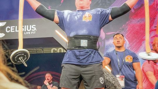Cedar Area Fire & Rescue Lieutenant Joseph Voiles competes in the ax hold event of the World Strongest Firefighter competition in Columbus, Ohio on Friday and Saturday.