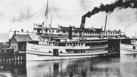 Traverse Bay Transportation Company formed in 1906, with its main dock in Traverse City. Orson Peck postcard