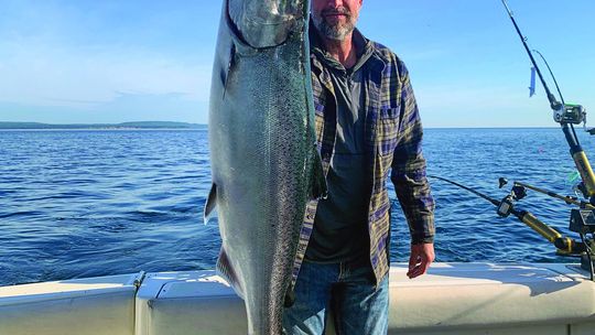 A salmon that neared 20 pounds was caught earlier this month aboard the Mariah charter boat off the shores of North Manitou Island. Courtesy photo