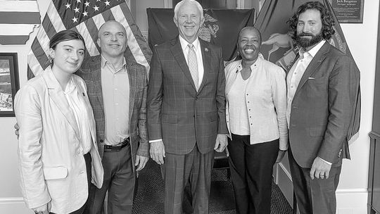 Addison and Eric LaPugh (left) stand with Michigan congressman Jack Bergman on behalf of the National Parks Conservation Association. Courtesy photo