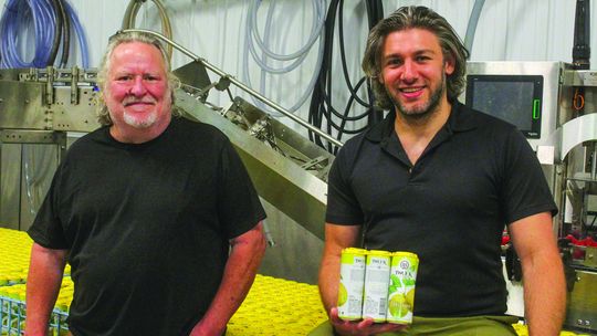 Adam Satchweil (left) and Kurt Barry (right) lead the winemaking efforts for Two K Farms Cidery &amp; Winery. Enterprise photo by Brian Freiberger