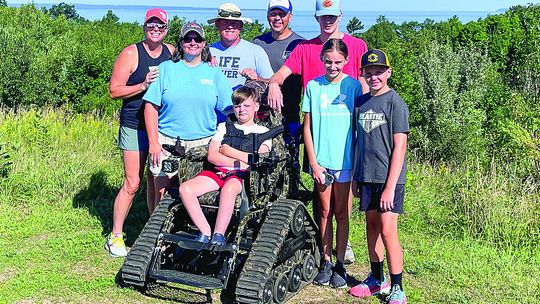 Members of this family can explore Sleeping Bear Dunes National Lakeshore as one group thanks to the Friends of Sleeping Bear. Courtesy photo