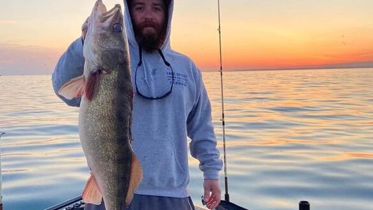 Greg Alsip is pictured after catching a walleye on Lake Michigan. Courtesy photo