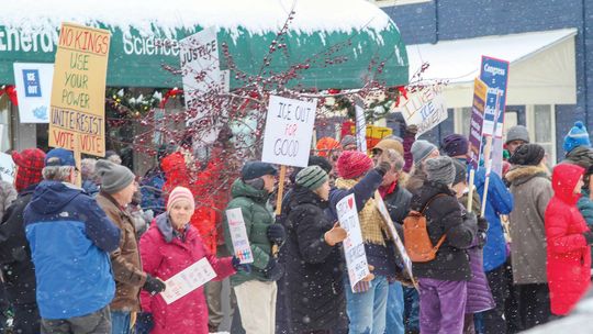 Well over 100 people protested