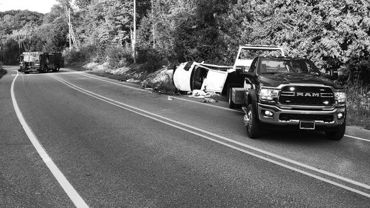 The driver of this trashed vehicle was arrested after crashing on S. Lake Leelanau Drive. Photo courtesy of Frank Maly