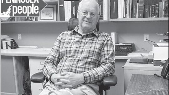 Leelanau County resident Jim Dyer serves as the manager for the Village of Northport. After years of searching the housing market, Dyer and his wife, Jeanette, finally found a home in Suttons Bay last fall. Enterprise photo by Meakalia Previch-Liu