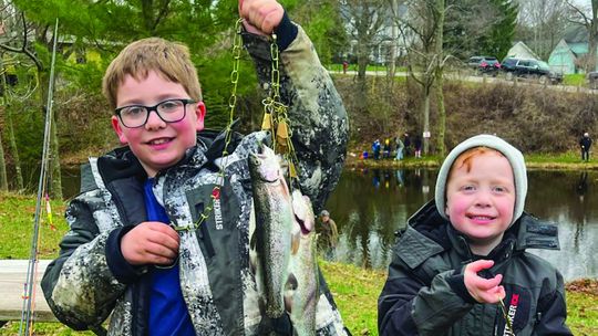 Youth of all ages were busy catching rainbow trout at the Mill Pond in Northport