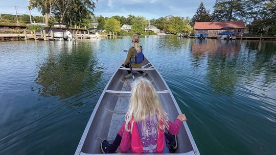 Zinnia and Juniper Schaberg went for a family canoe ride on the Leland/Carp River Sunday with their dad