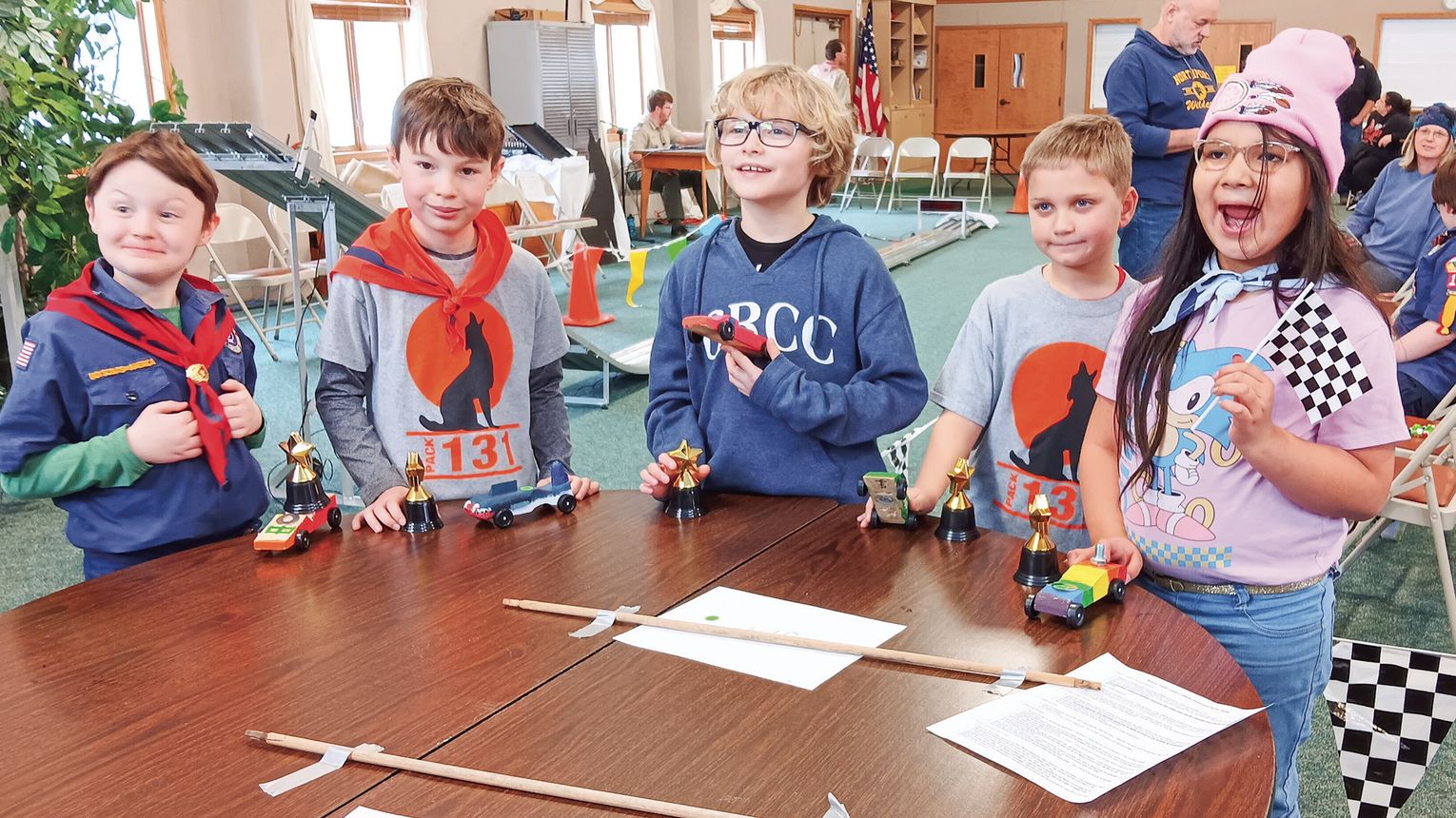 Cub Scouts race in Pinewood Derby