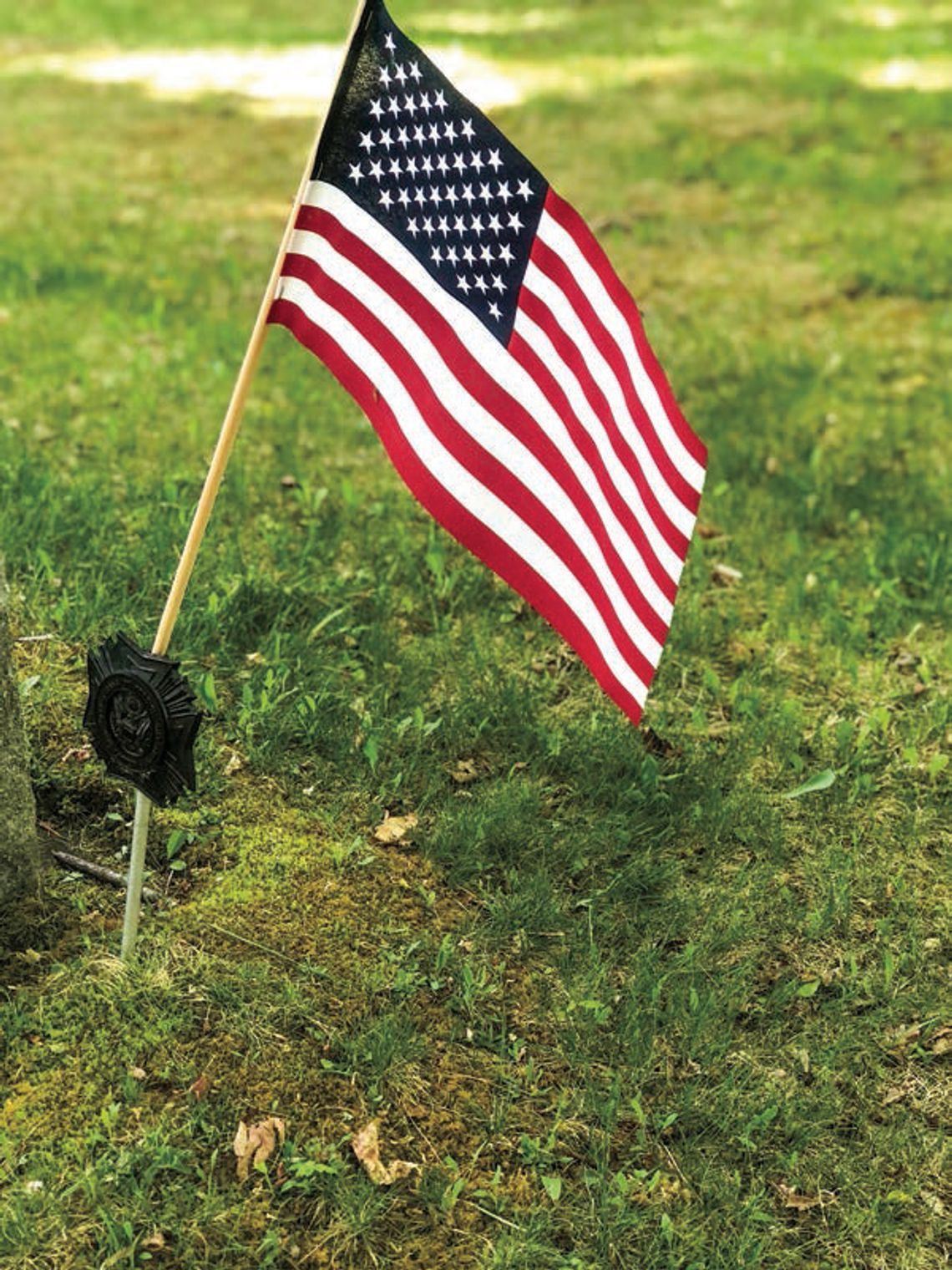 American flags designate the graves of veterans. Enterprise photo by Amy Hubbell