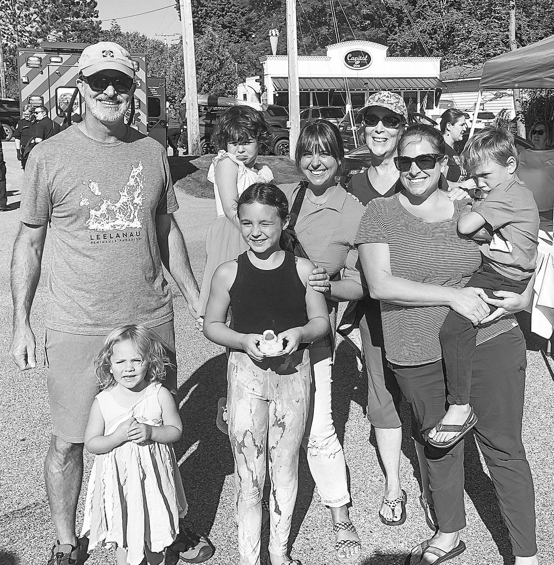 The Dembowske family of Suttons Bay showed up in force for the Lake Leelanau bridge walk. From left are patriarch Bob Dembowske; Isla Korson, 3; duck race winner Edyn Gallagher, 8; Ashley Gallagher, who is holding her daughter, Sutton, 3; Dee Dembowske; and Shannon Korson, who is holding Z...