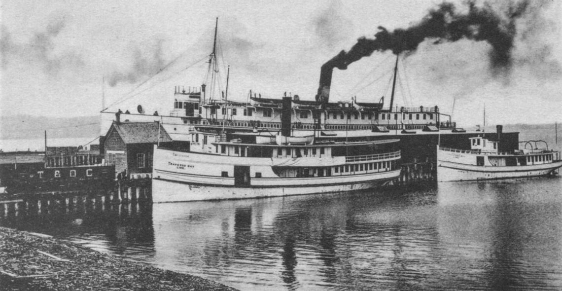 Traverse Bay Transportation Company formed in 1906, with its main dock in Traverse City. Orson Peck Postcard