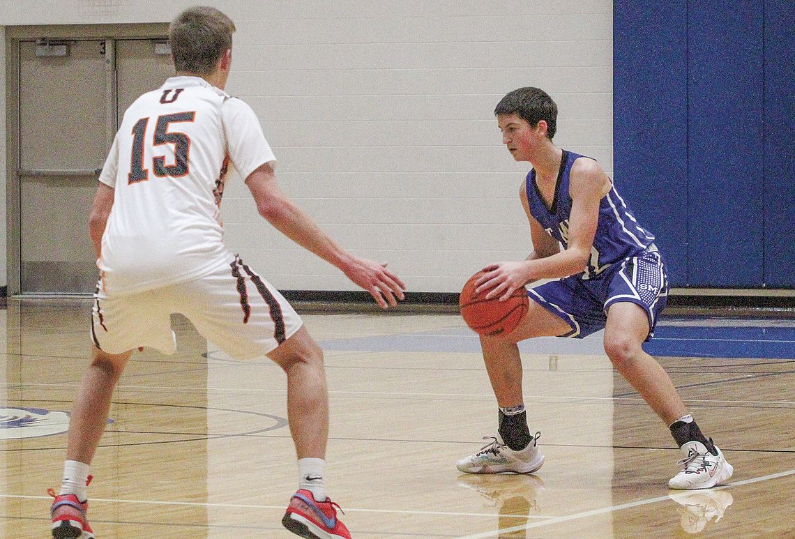Lake Leelanau St. Mary freshman Josh Bunek dribbles before finding a teammate during a holiday tournament against Ubly to end 2023. Enterprise photos by Brian Freiberger
