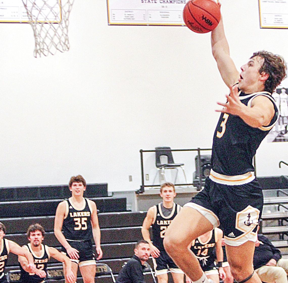 Glen Lake defeated Leland Tuesday night in a Northwest Conference game 74-20. Glen Lake junior guard Benji Allen attempts a dunk against Leland.