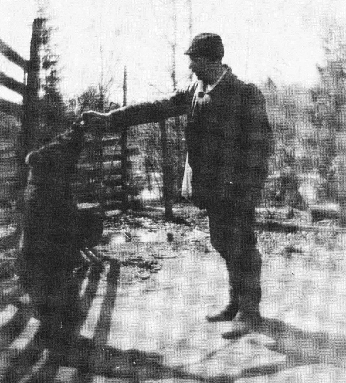 Frank Kratochvil and his pet bear having a beer. Photo courtesy of Elmwood Township a Pictoral History