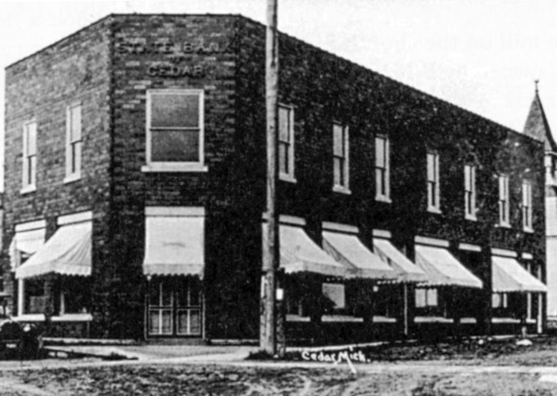 The Cedar Bank and Sbonek Store before the fire and after the fire on March 2, 1926.
